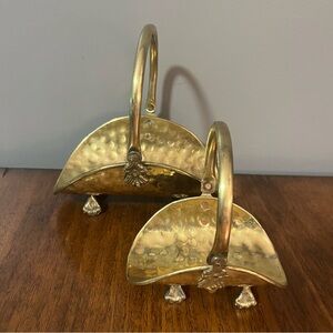 2 mid-century miniature brass baskets with hammered texture and claw feet.